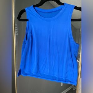 Train to be tank. Blazer blue. Pilling on front where running belt rubbed